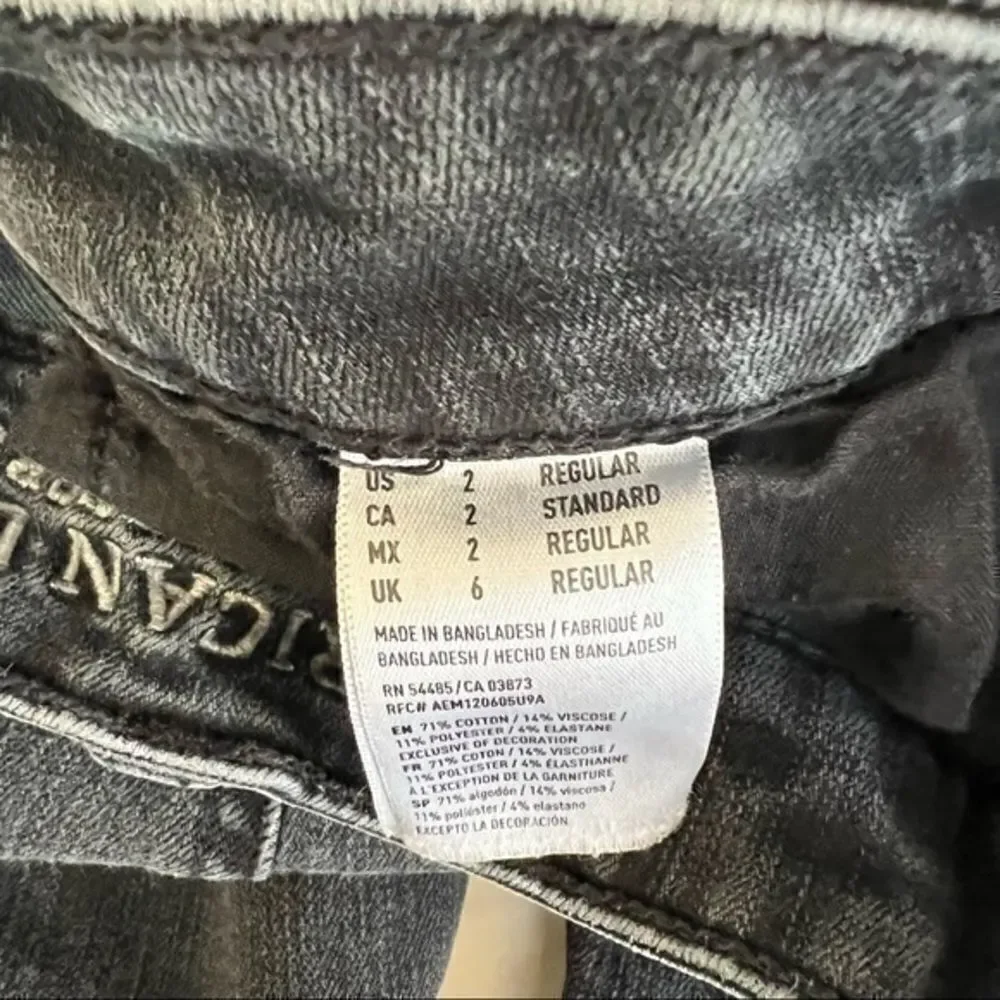 American Eagle dark grey super stretch skinny jeans regulas size 2 raw hem